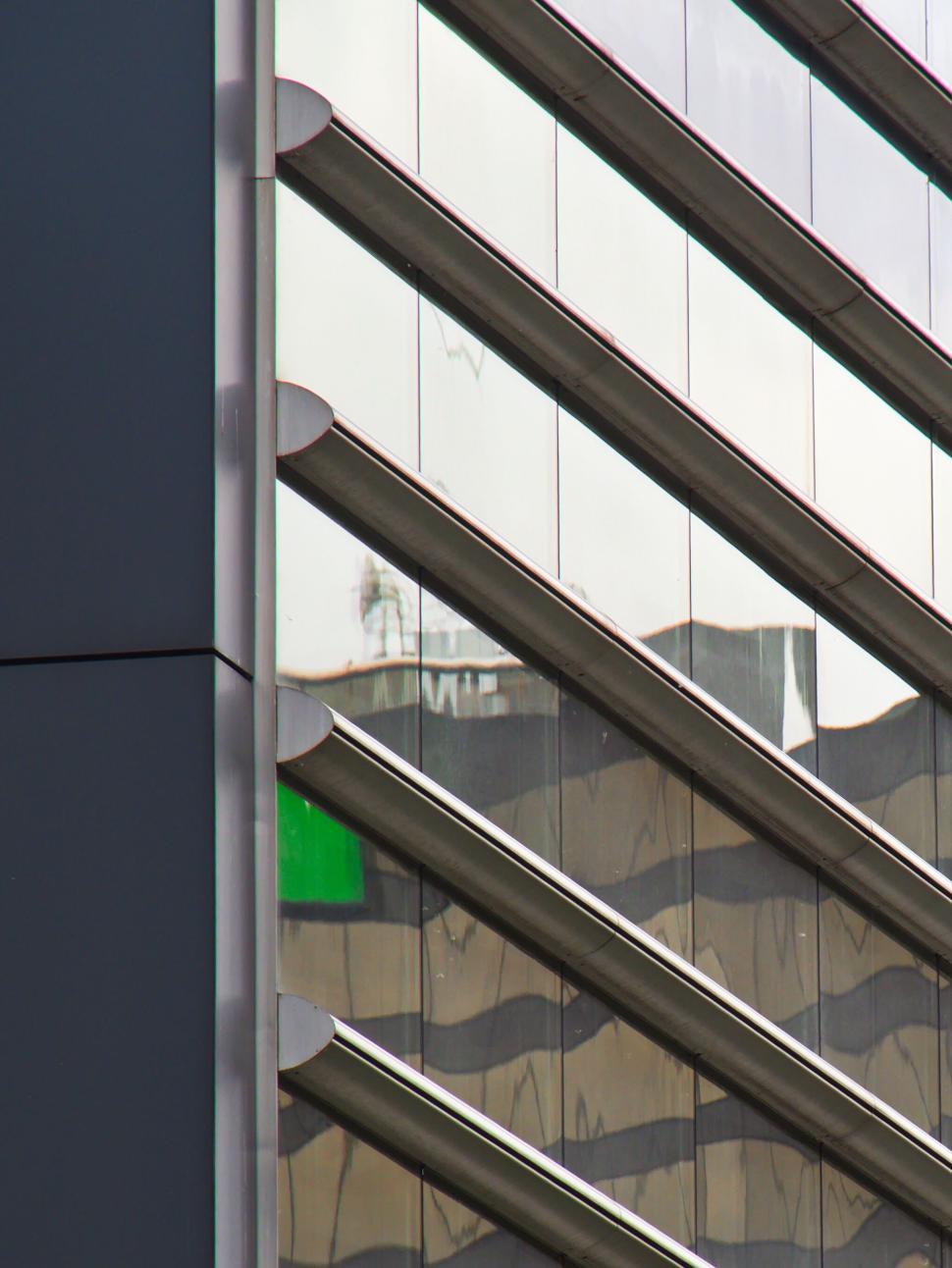 Free Image of Reflective building with angular and bold design 