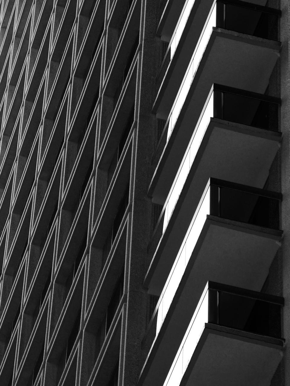 Free Image of Black and white image of a building with balconies 