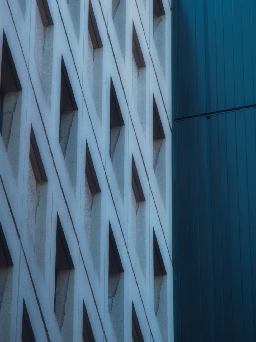 Free Image of Concrete and steel building with unique geometric design 