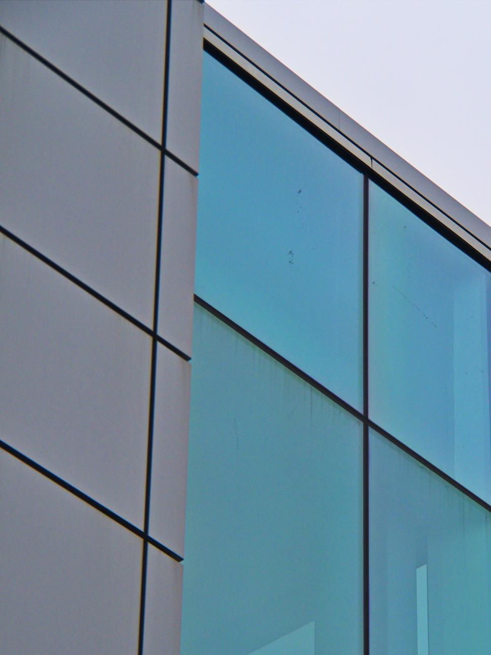 Free Image of Modern glass facade on a contemporary building corner 