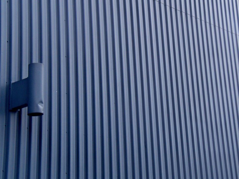 Free Image of Corrugated metal wall with exterior lighting fixture 