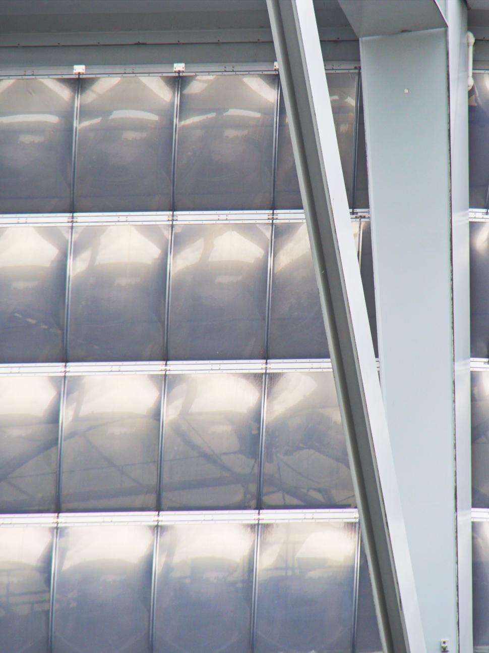 Free Image of Glass facade with steel support beams in modern design. 
