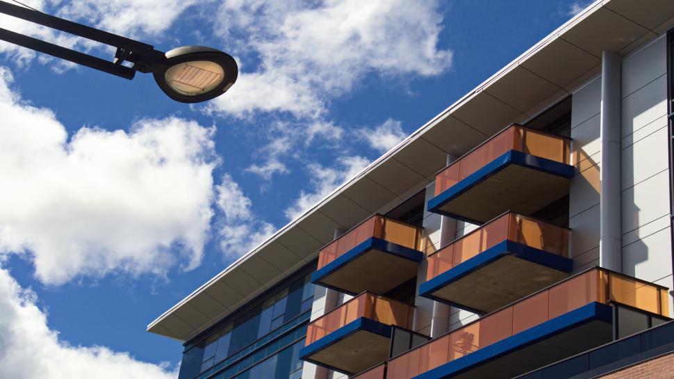 Free Image of Modern apartment building with balconies and sky view 