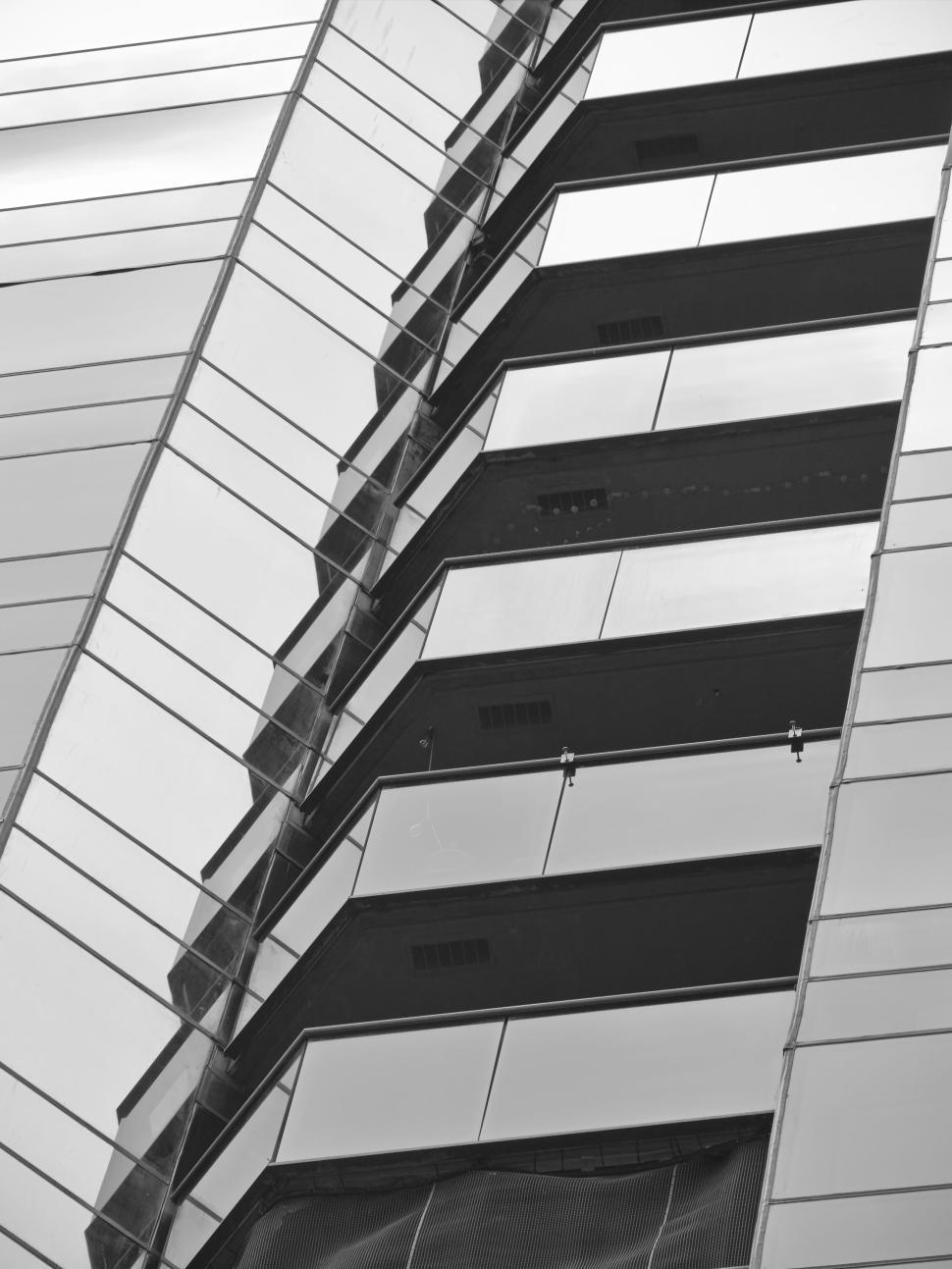 Free Image of Modern building with reflective glass surfaces 