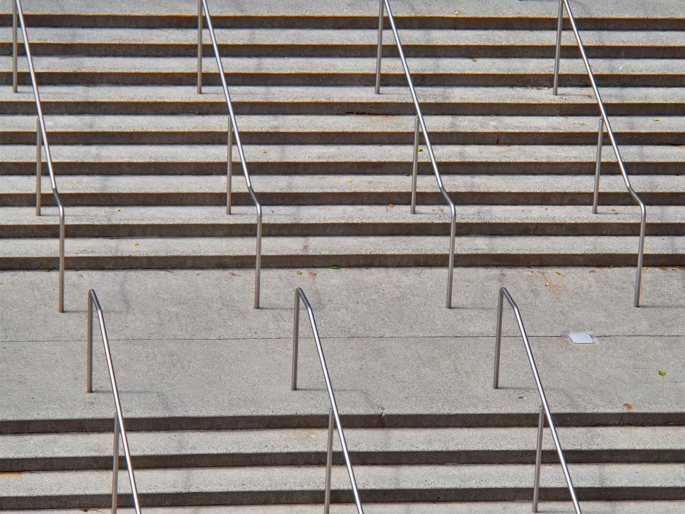 Free Image of Symmetrical steps with metal handrails urban design. 