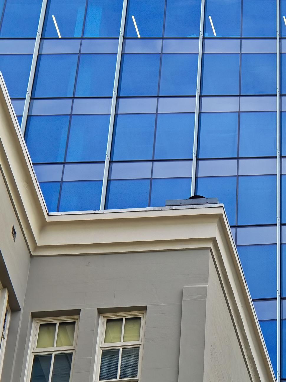 Free Image of Classical and modern building architecture in contrast 