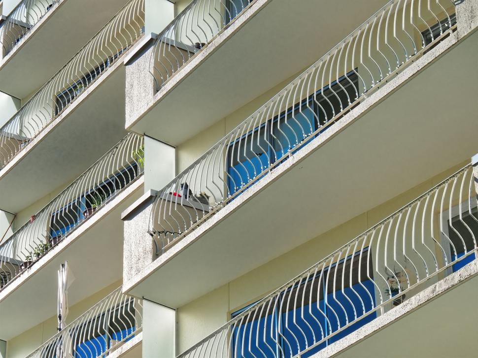 Free Image of Close-up of apartment balconies with railings 