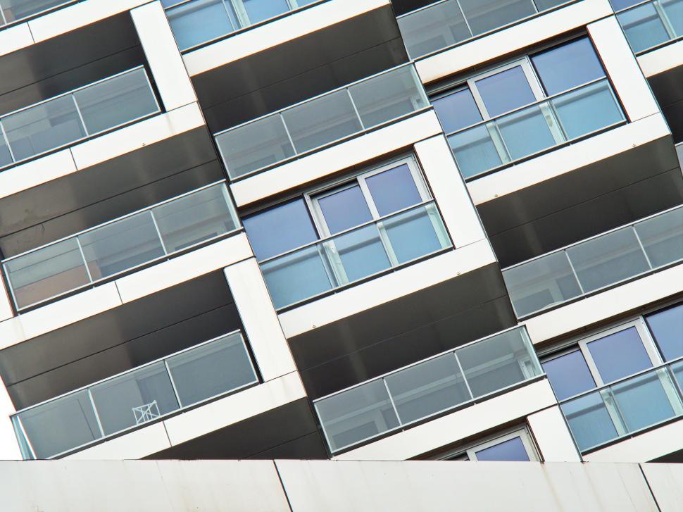 Free Image of Modern apartment building with geometric balconies view. 