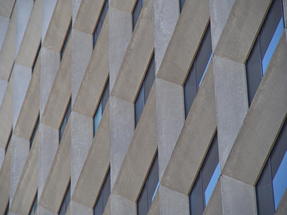 Free Image of Modern geometric concrete building with repetitive pattern. 