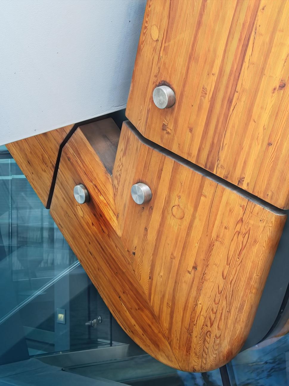 Free Image of Close-up of wooden architectural detail with bolts 