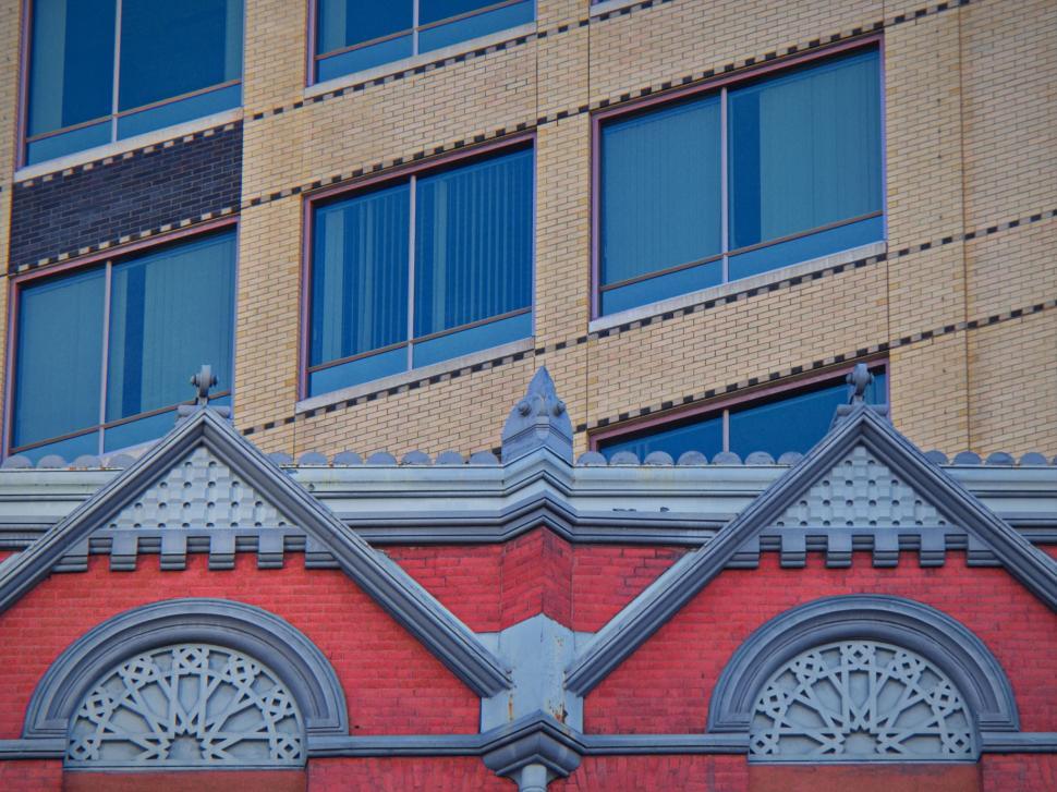 Free Image of Juxtaposition of old and new architectural styles urban 