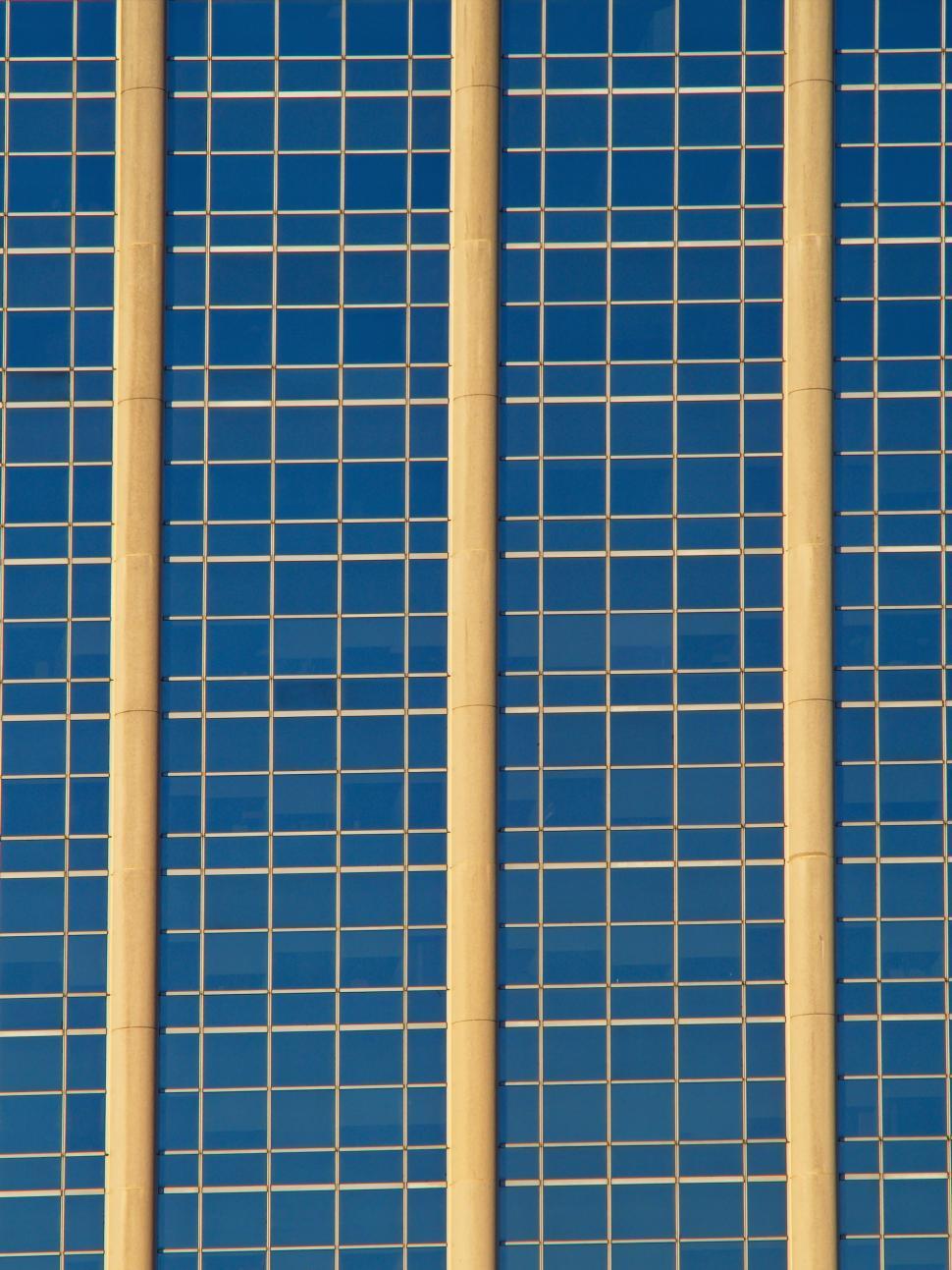 Free Image of Close-up of a modern skyscraper s window facade 