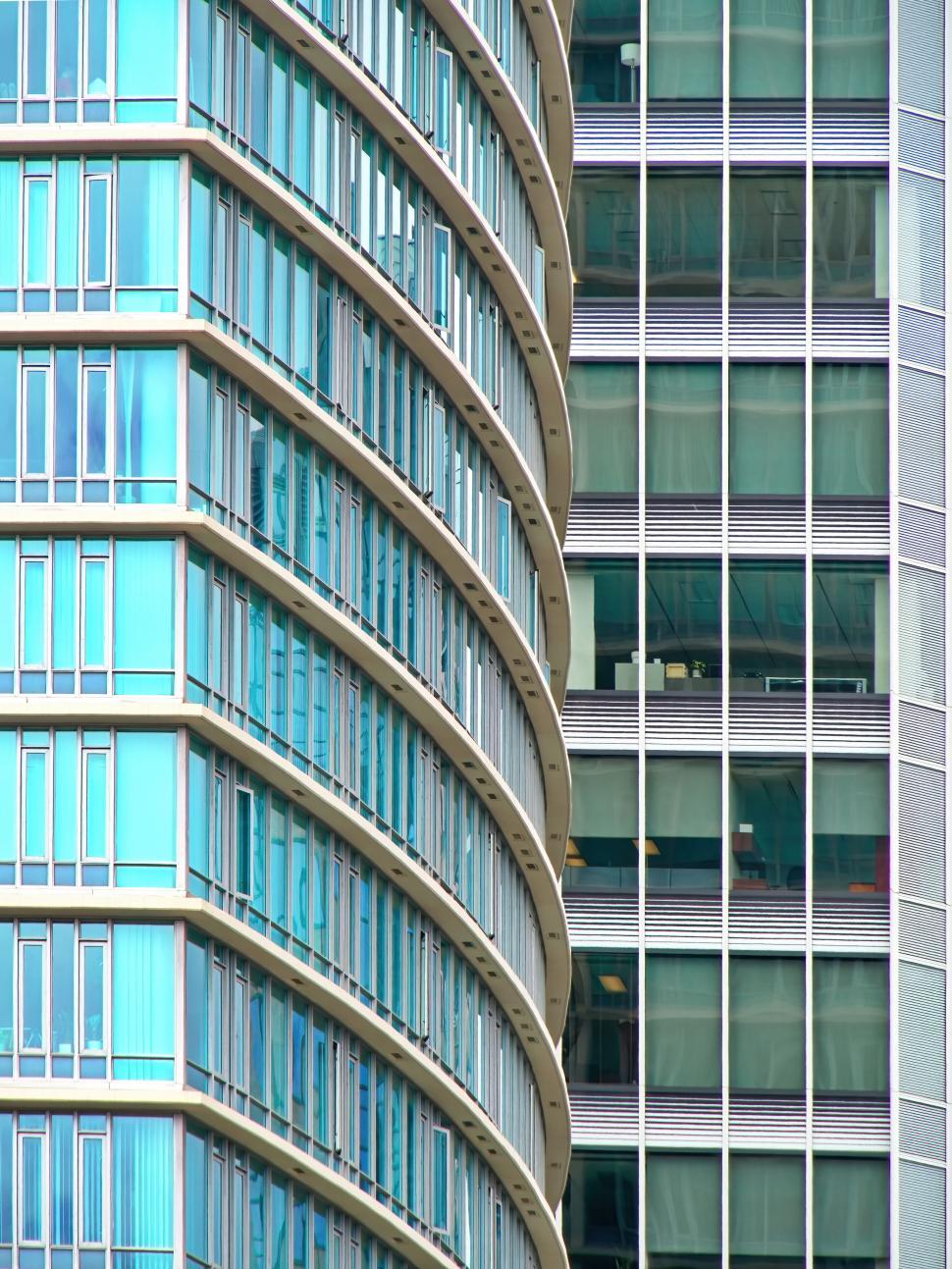 Free Image of Round glass and steel exterior of contemporary building 