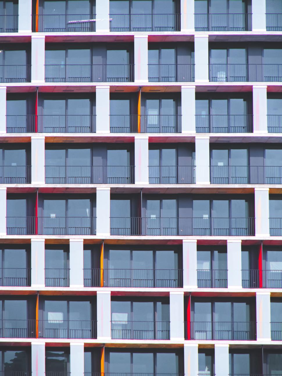 Free Image of Multi-Colored Modern Apartment Building Facade 