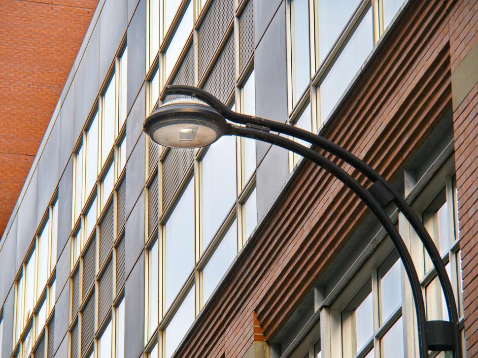Free Image of Classic urban street light against a brick building 