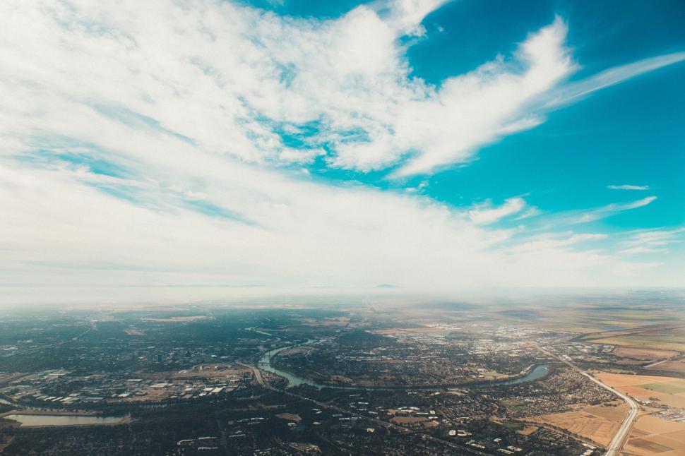 Free Image of Aerial view of expansive city landscape on a clear day 