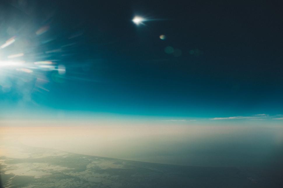 Free Image of Stunning view of earth and sky from high altitude flight. 