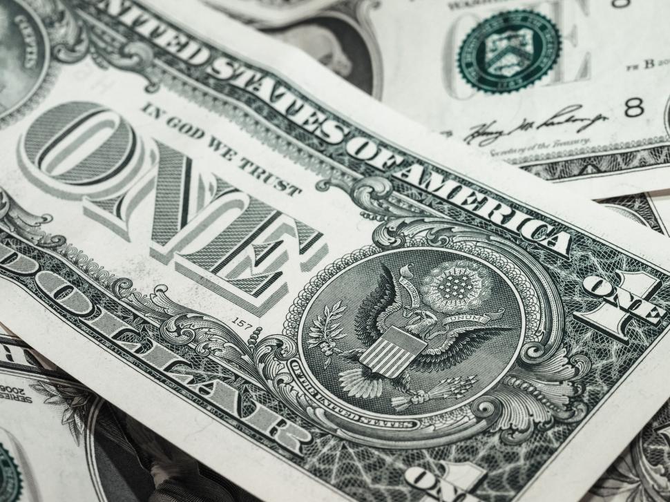 Free Image of One-dollar bills closely stacked, emphasizing currency 