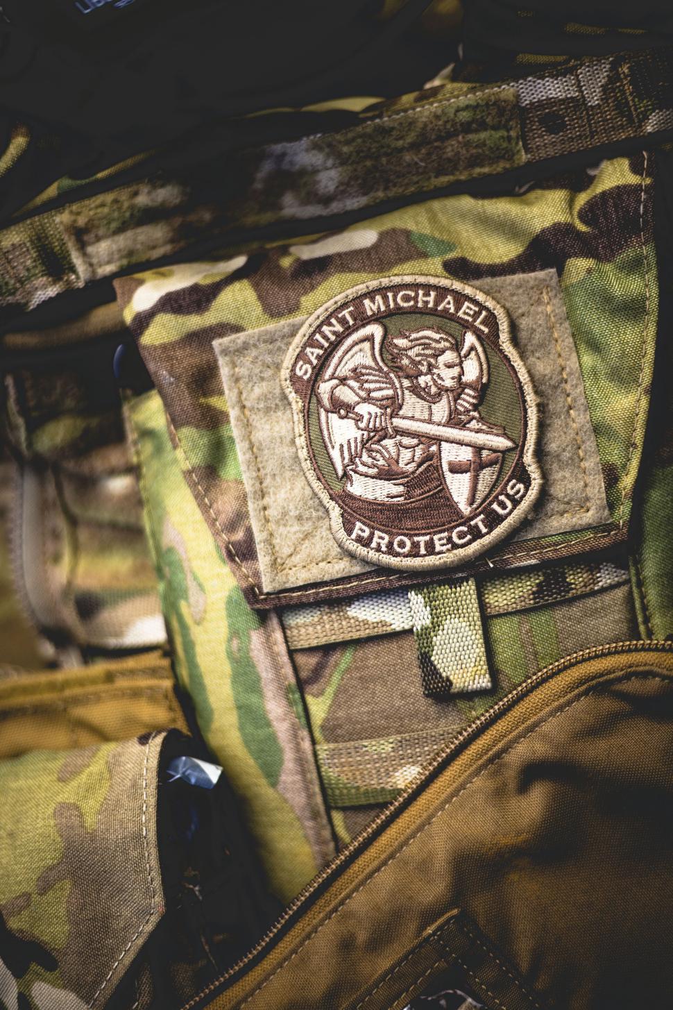 Free Image of Close-up of military uniform with Saint Michael patch 