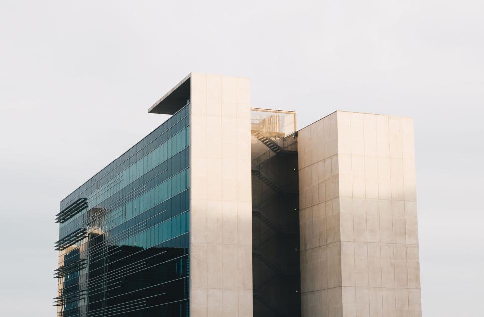 Free Image of Minimalist modern building with geometric glass facade 