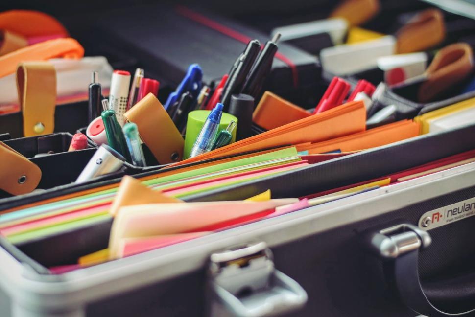 Free Image of Close-up of a well-organized briefcase with supplies. 