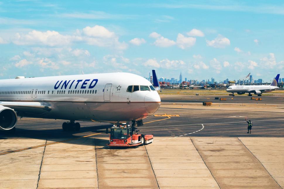 Free Image of United Airlines airplane preparing for departure 