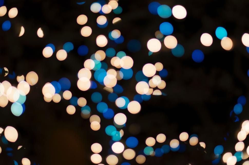 Free Image of Abstract blurred lights with bokeh effect at night. 