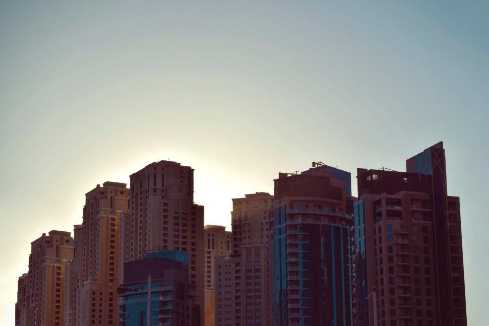 Free Image of Skyline of modern high-rise buildings at sunset. 