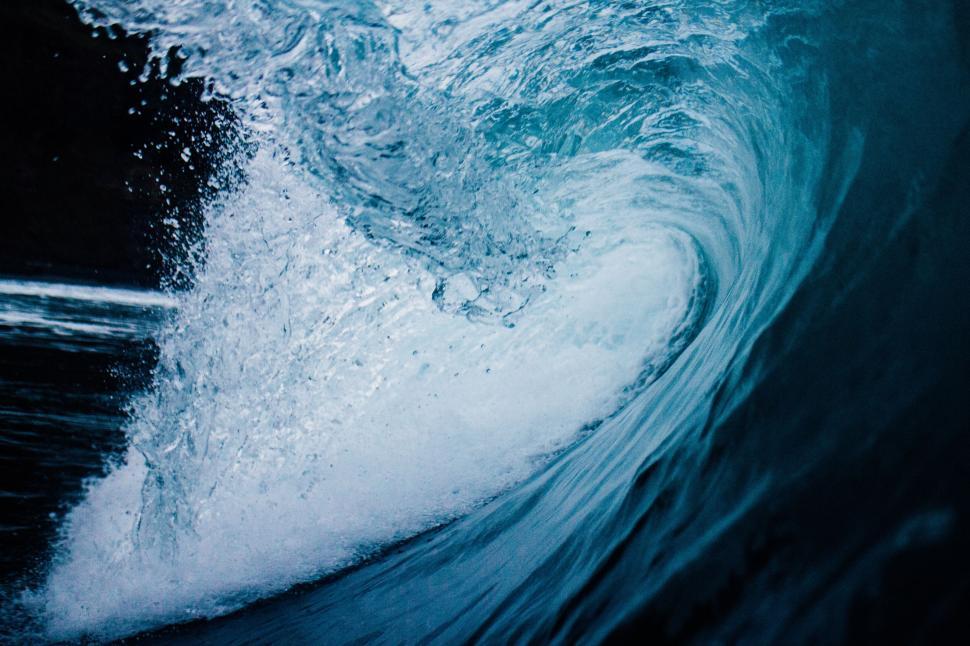 Free Image of An up-close shot of a massive wave in the ocean 