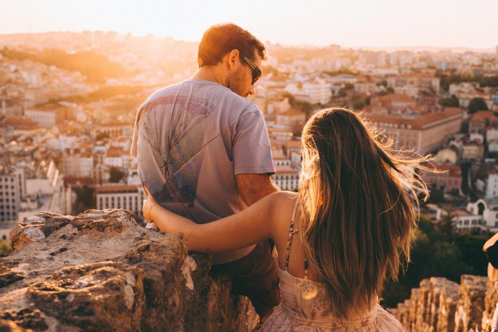 Free Image of Couple Enjoying City View at Sunset in Scenic Spot 