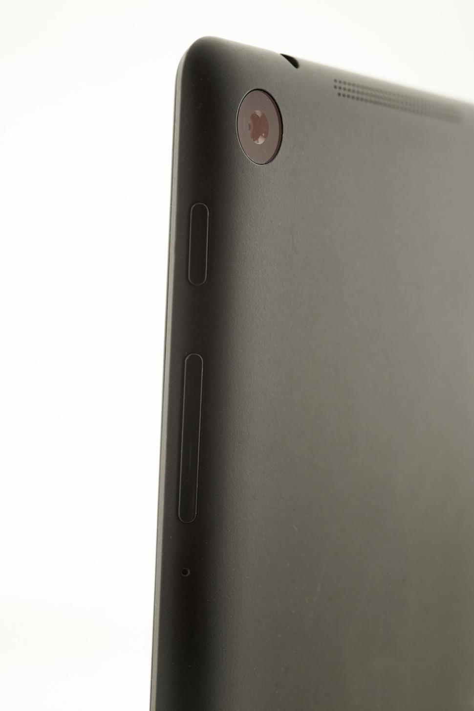 Free Image of Black tablet with camera and buttons on a white backdrop. 