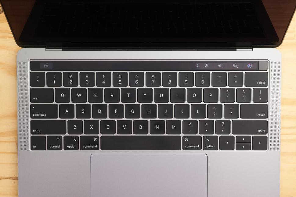 Free Image of Top view of a laptop keyboard with modern sleek design. 