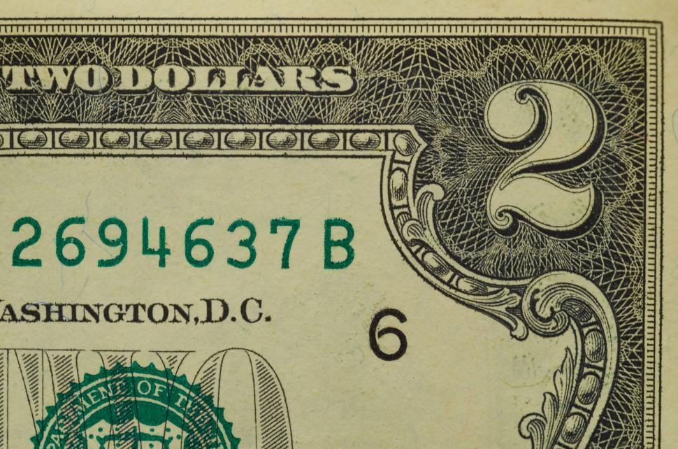 Free Image of Two dollar bill section showing design and typography 