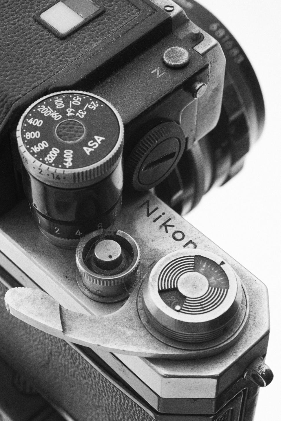 Free Image of Close-up of vintage Nikon camera with control dials 