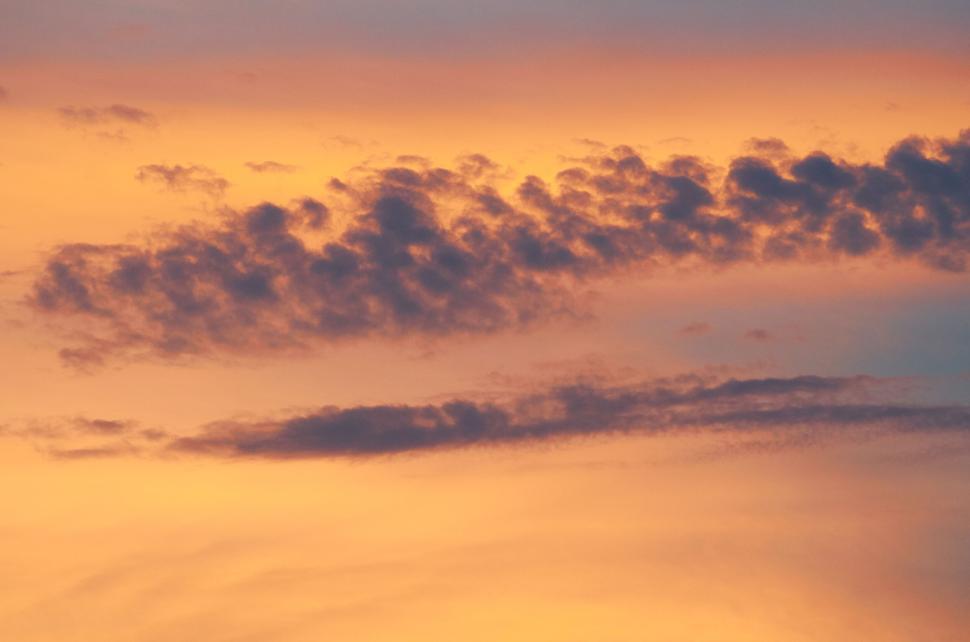 Free Image of Beautiful sunset with colorful clouds in the sky. 