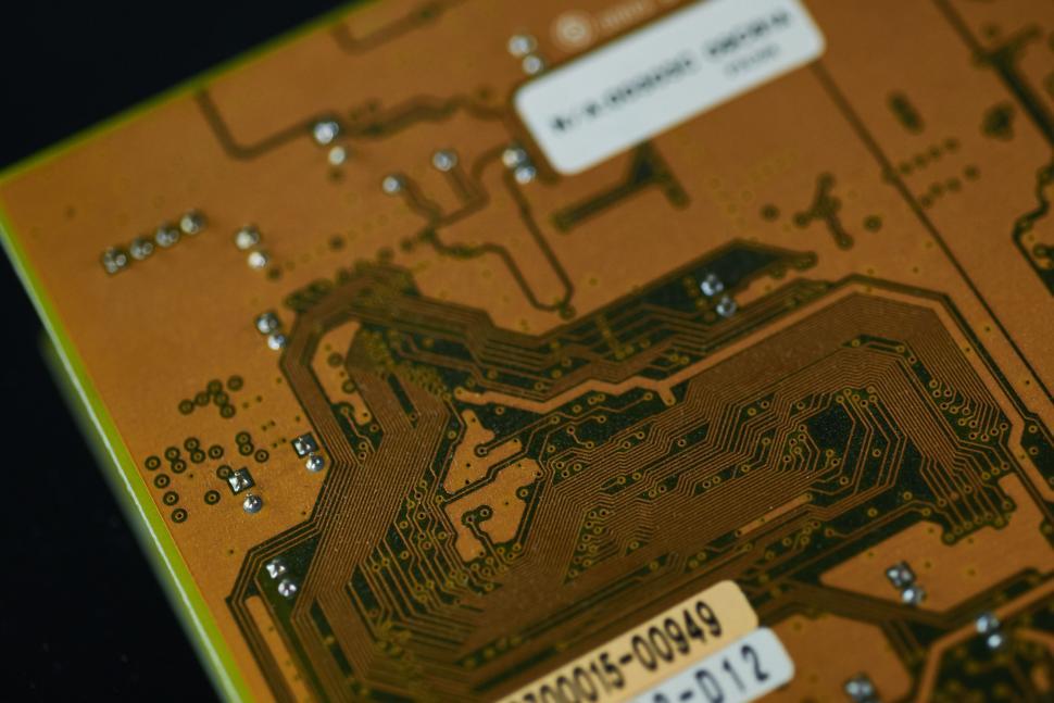 Free Image of Close-up of circuit board with intricate pathways 