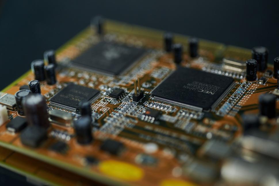 Free Image of Macro image of an electronic circuit board with details. 