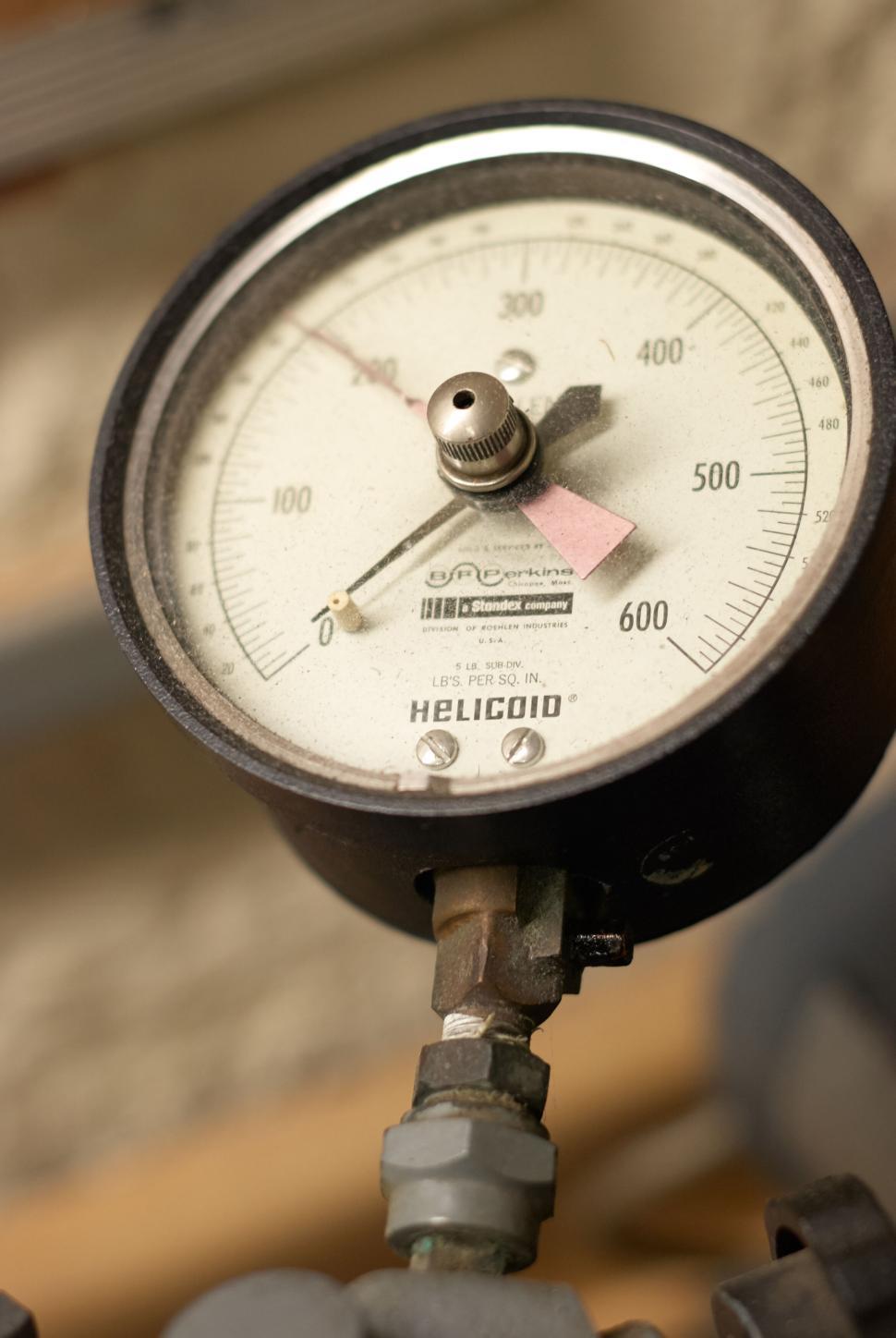 Free Image of High-pressure gauge showing needle in the red zone 