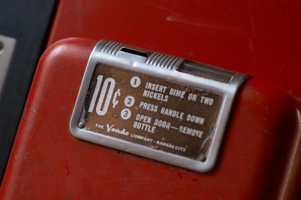 Free Image of Vintage vending machine with price label for sodas 