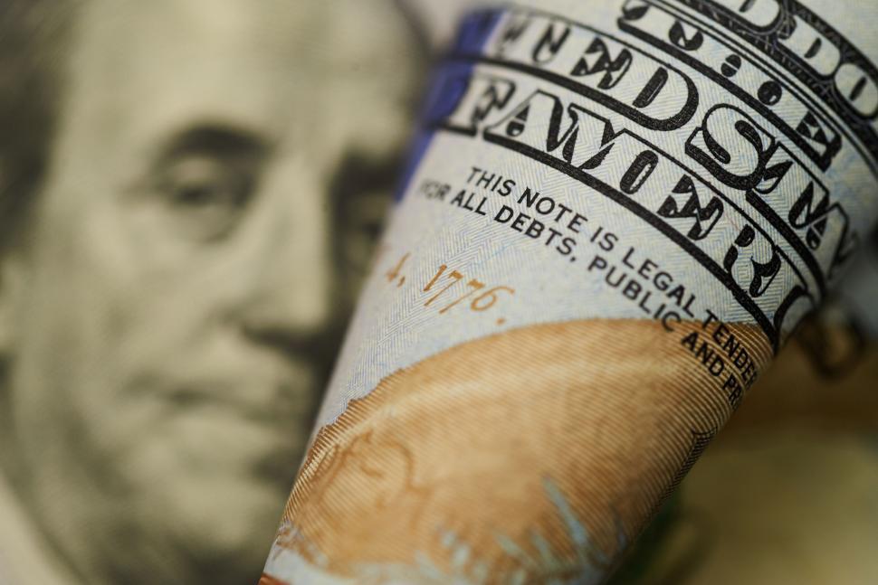 Free Image of Close-up detail of Benjamin Franklin on hundred-dollar bill 