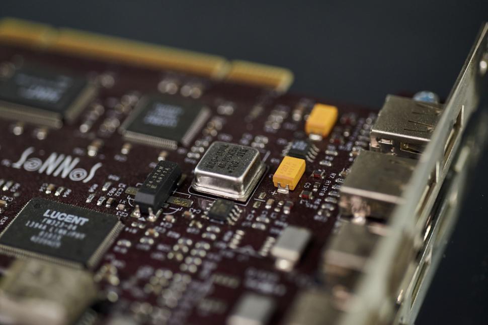 Free Image of Computer circuit board with chips and components. 