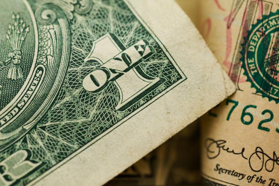 Free Image of Close-up of a US dollar bill alongside another bill 