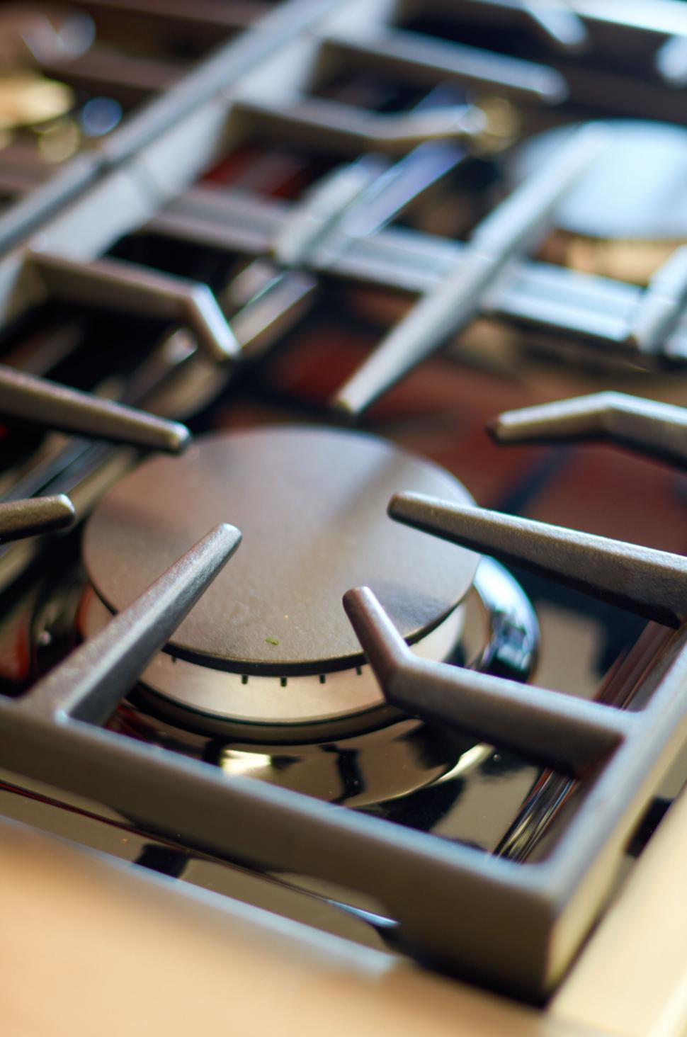 Free Image of Close-up of a gas stove burner with modern design. 