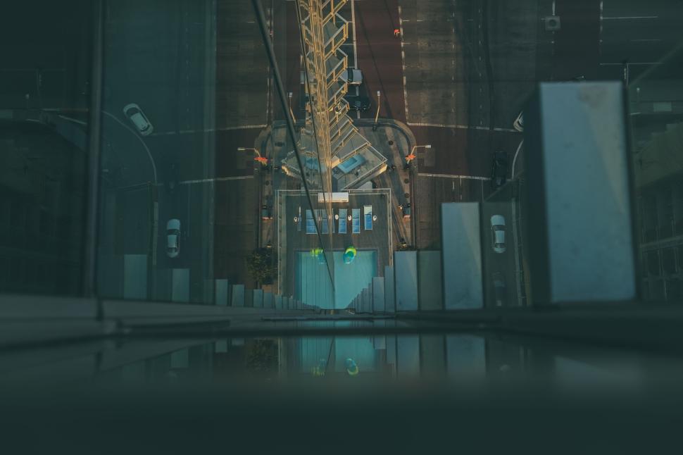 Free Image of View from a high-rise building down the street below 