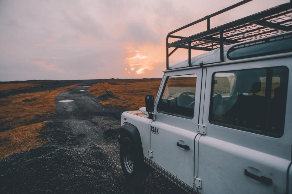 Free Image of Four-wheel drive vehicle on a rugged, lonely road 