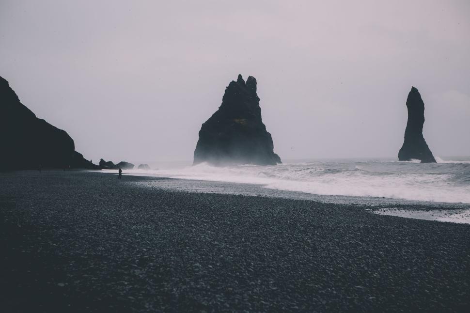 Free Image of Mysterious sea stacks rise from the ocean waves 