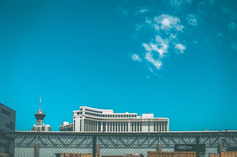 Free Image of Modern cityscape featuring a landmark observation tower 