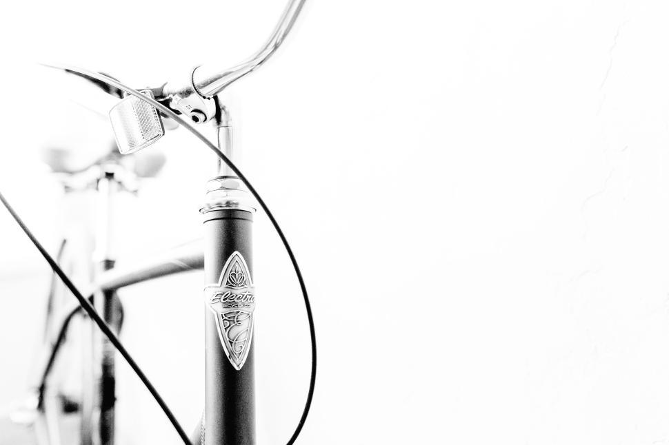 Free Image of Black and white bicycle in a minimalistic setting. 