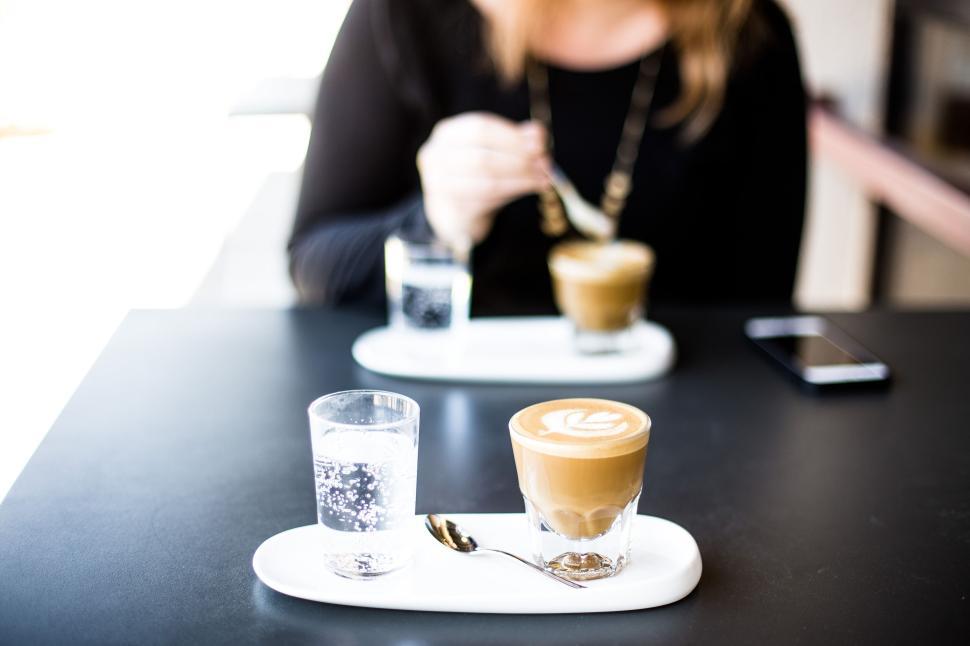 Free Image of Close-up of a coffee table with glasses and cups. 