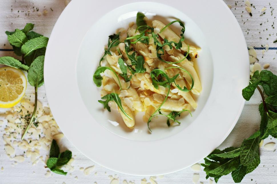 Free Image of Plate of gourmet pasta with herbs and delicate garnish 